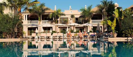 2 outdoor pools, pool umbrellas, pool loungers