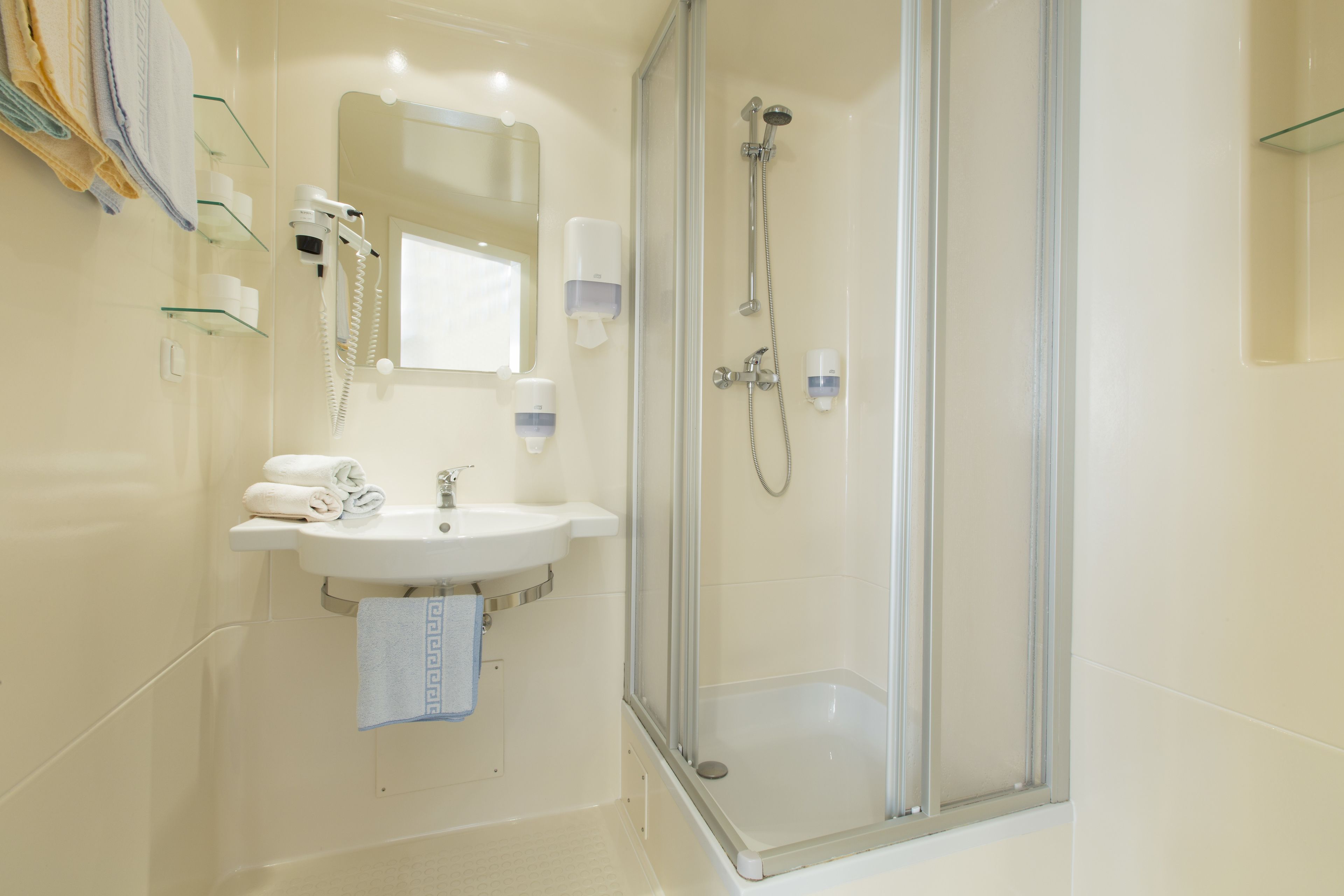 family room | bathroom | shower, free toiletries, hair dryer, towels