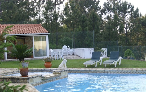 Outdoor pool, pool umbrellas, pool loungers