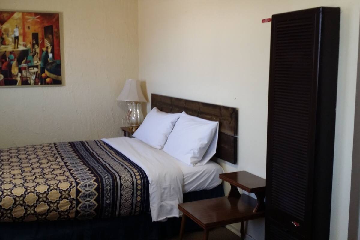 Desk, blackout curtains, free WiFi, bed sheets