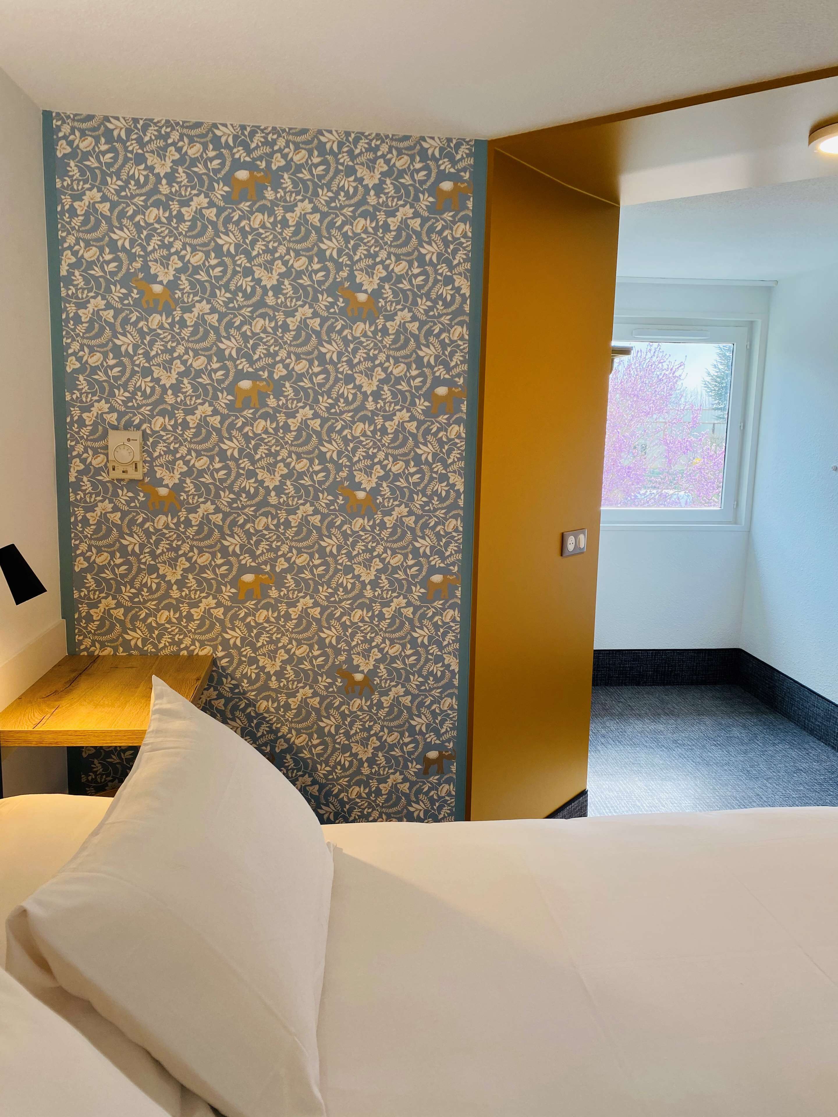 desk, blackout curtains, soundproofing, iron/ironing board