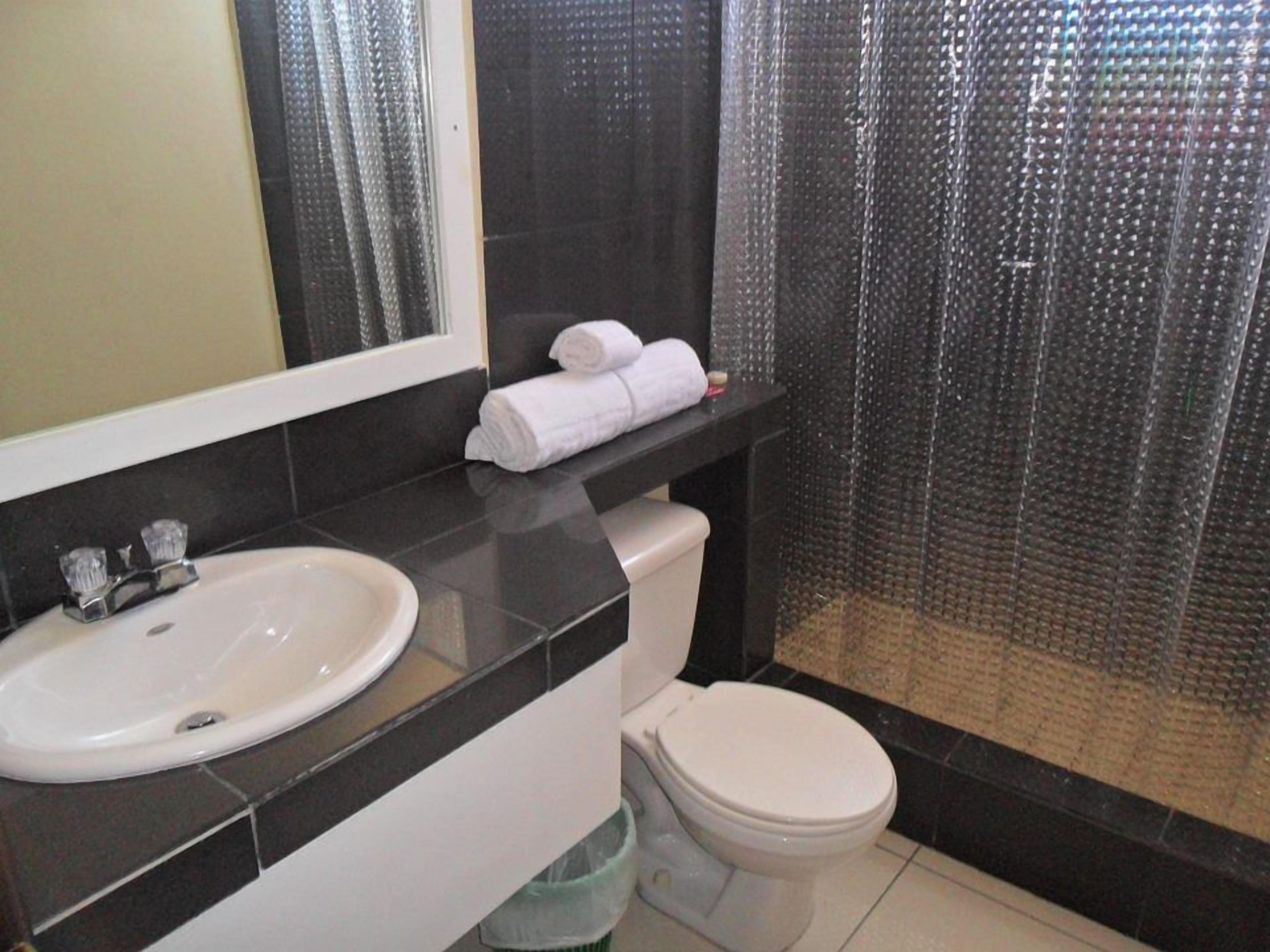 business double room, 2 double beds | bathroom | shower, towels