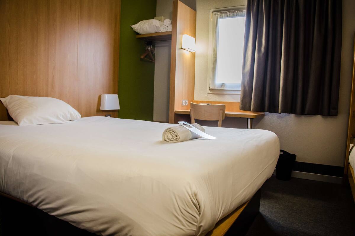 premium bedding, desk, blackout curtains, soundproofing