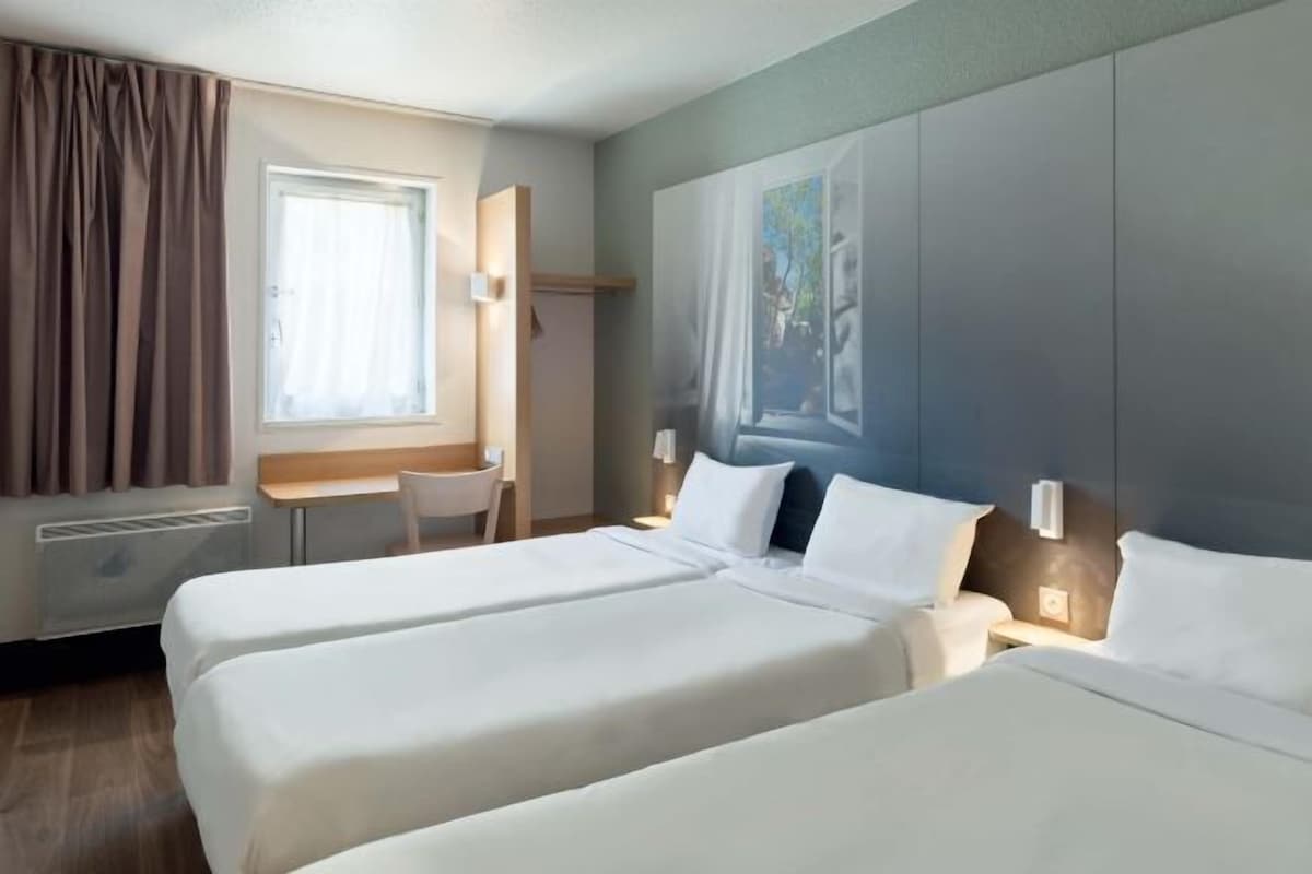 Premium bedding, desk, blackout curtains, soundproofing
