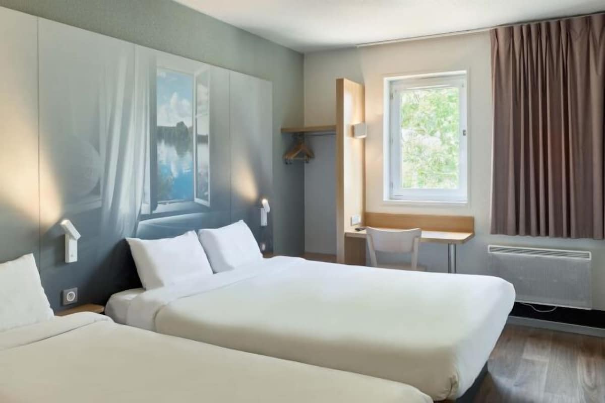 Premium bedding, desk, blackout curtains, soundproofing