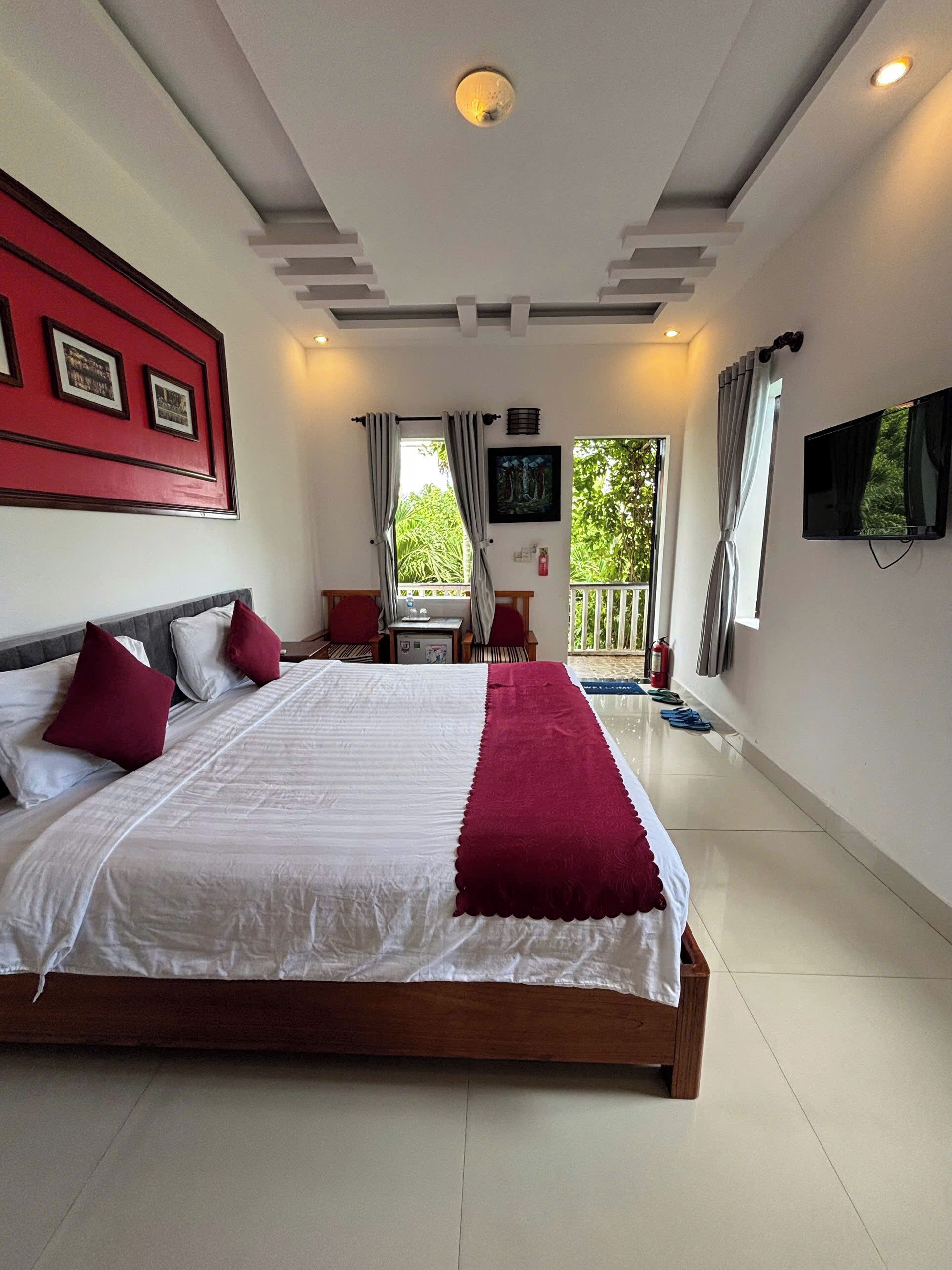 Deluxe kamer, 1 twee- of 2 eenpersoonsbedden, balkon | Een minibar, een kluis op de kamer, een bureau, gratis wifi