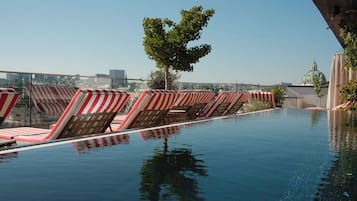 Outdoor pool, pool umbrellas, pool loungers