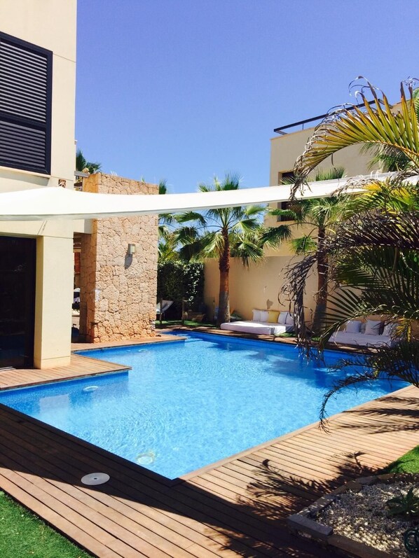 Outdoor pool, pool umbrellas, pool loungers