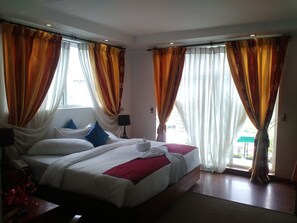 Deluxe Room, 1 Double Bed | Living room | 32-inch LCD TV with cable channels, TV