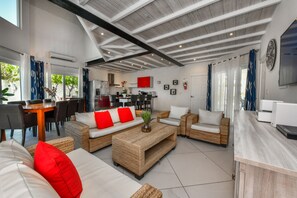 Pool side villa 3 with Private Garden Hot Tub XXL | Living area | 50-inch Smart TV with cable channels, Netflix, streaming services