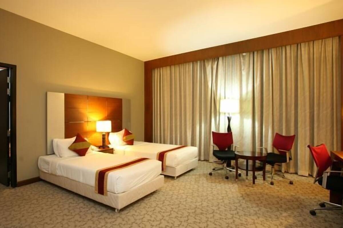 Chambre Deluxe double ou avec lits jumeaux, 1 chambre, fumeur, vue sur la ville | Literie de qualité, minibar contenant certains articles gratuits