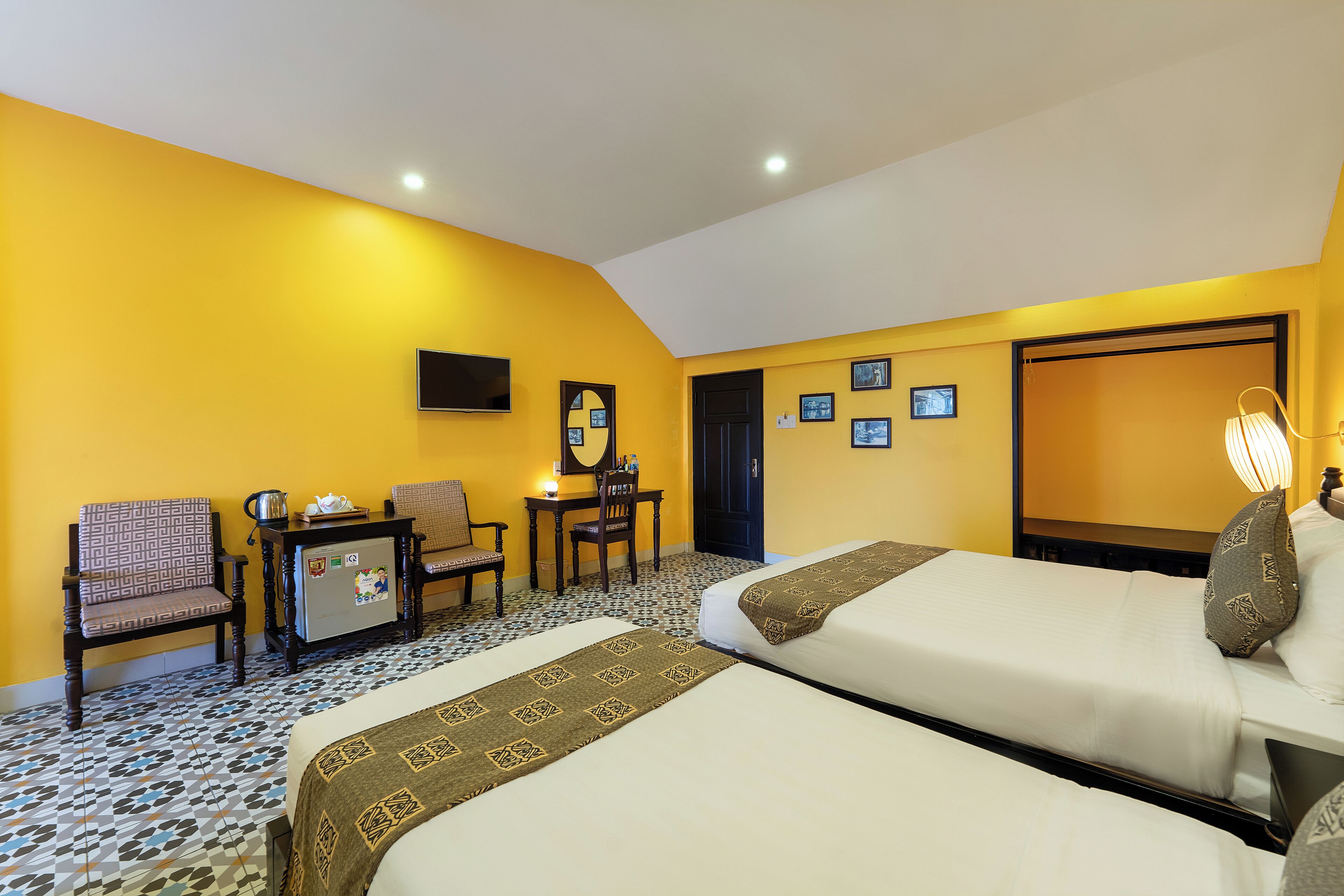 luxury triple room | in-room safe, desk, laptop workspace, soundproofing