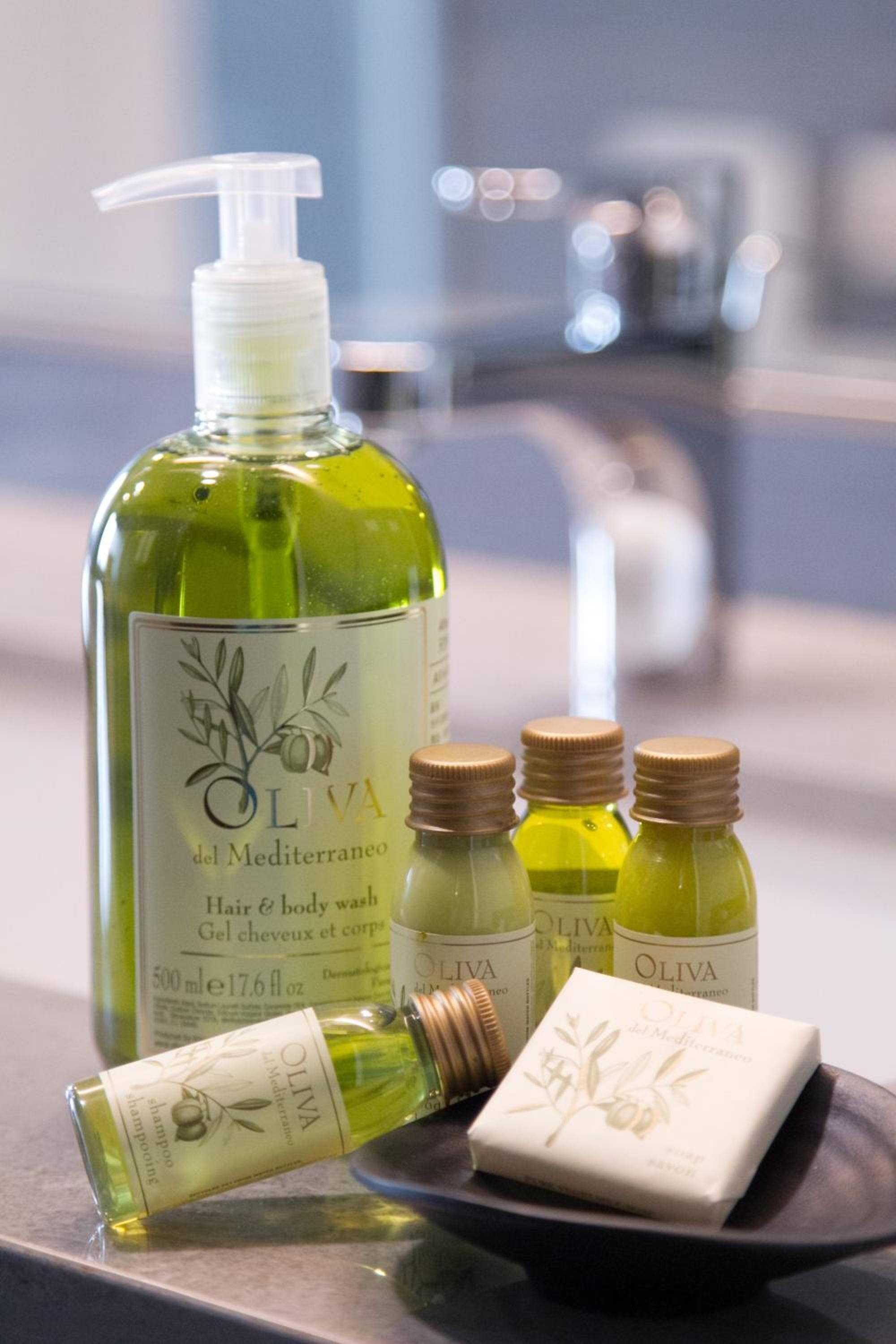 rainfall showerhead, hair dryer, slippers, towels