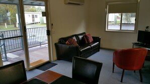 Deluxe Cabin, 2 Bedrooms, Accessible | Living area | Flat-screen TV - Horsham Riverside Caravan Park (Horsham)