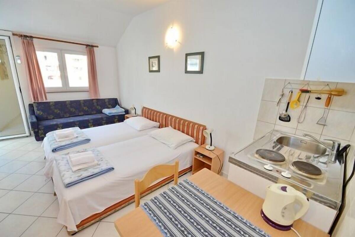 Standard Studio, Kitchen, City View (Teracce) | Living area | TV