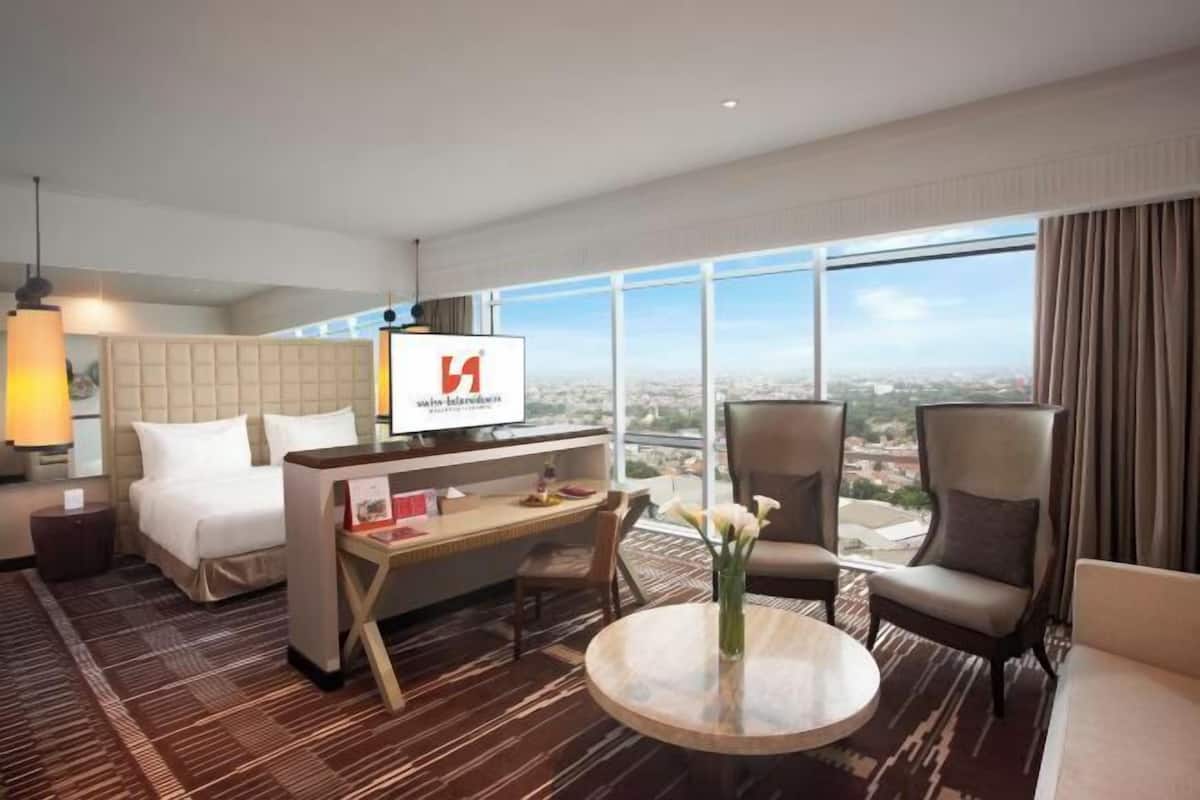 Premium bedding, memory-foam beds, in-room safe, desk