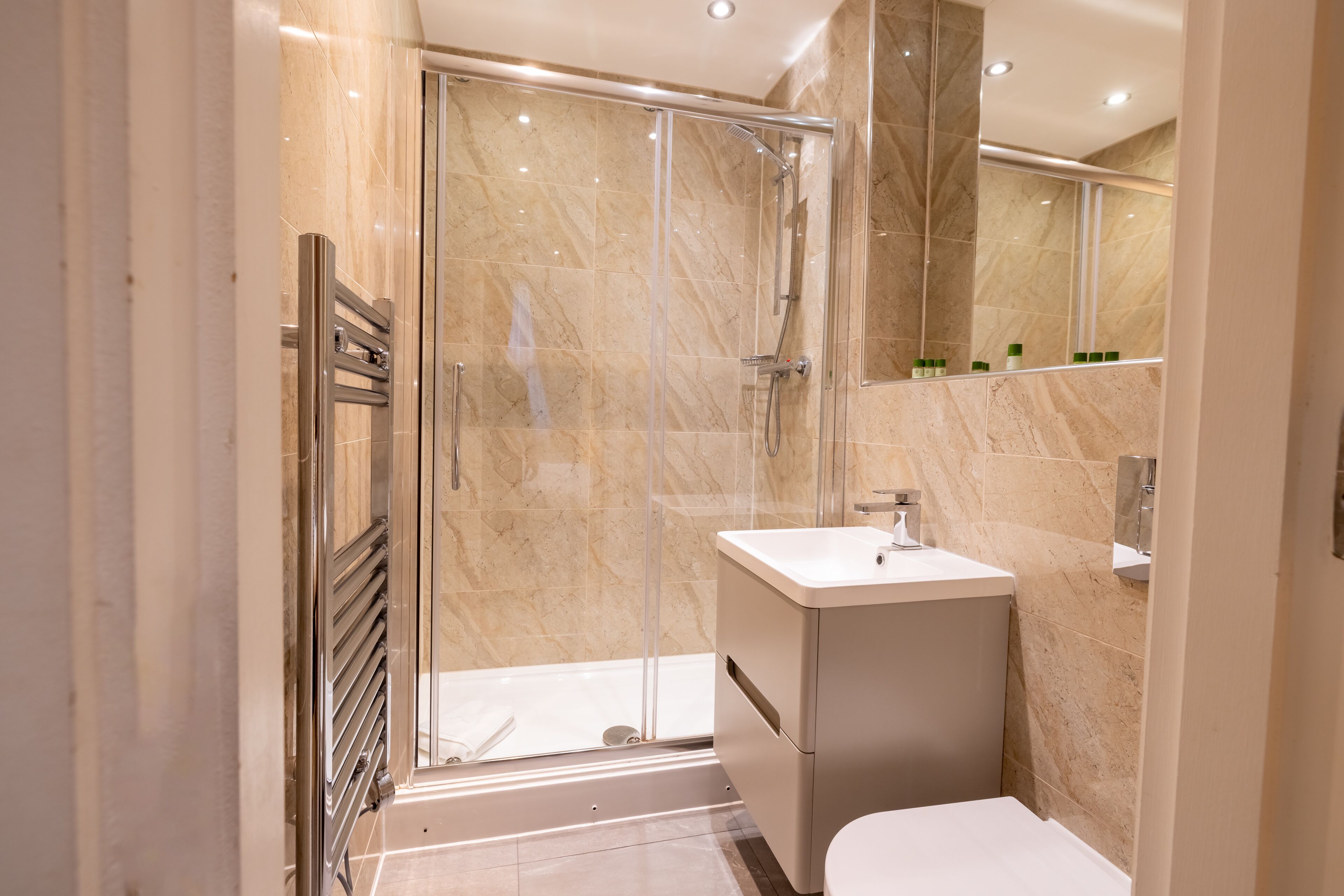 deluxe double room | bathroom | shower, free toiletries, towels, soap