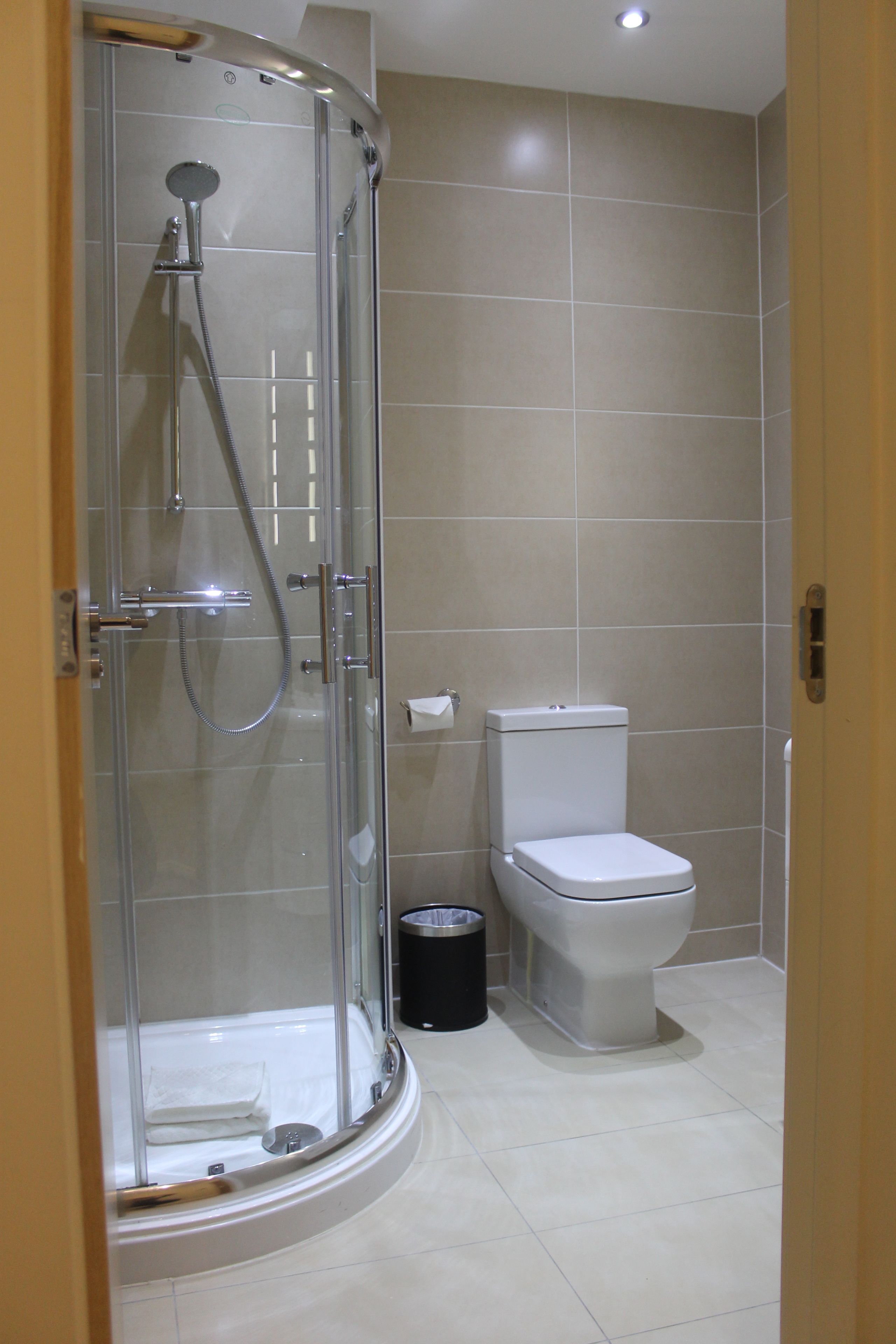 deluxe double room | bathroom | shower, free toiletries, towels, soap