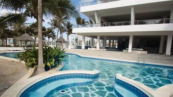 Outdoor pool, pool umbrellas, sun loungers