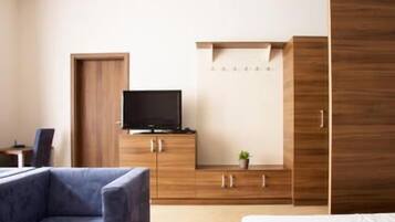 Superior Double Room | Living area | Flat-screen TV