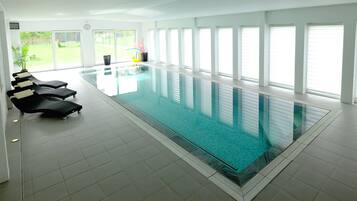 Indoor pool, open 9:00 AM to 10:00 PM, sun loungers