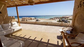 Habitación superior, vistas al mar | Terraza o patio