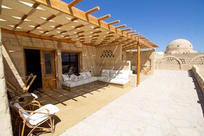 Habitación superior, vistas al mar | Terraza o patio