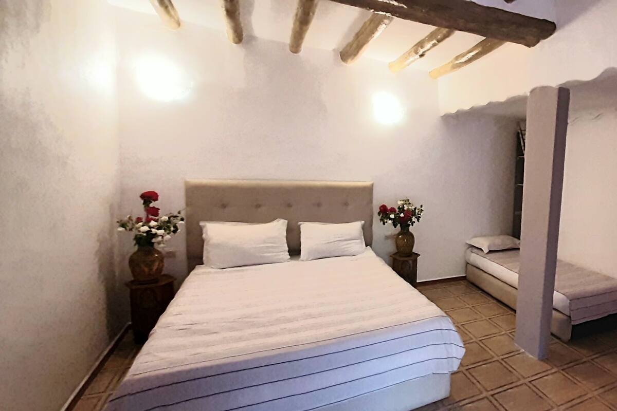 Ropa de cama de alta calidad y cortinas blackout