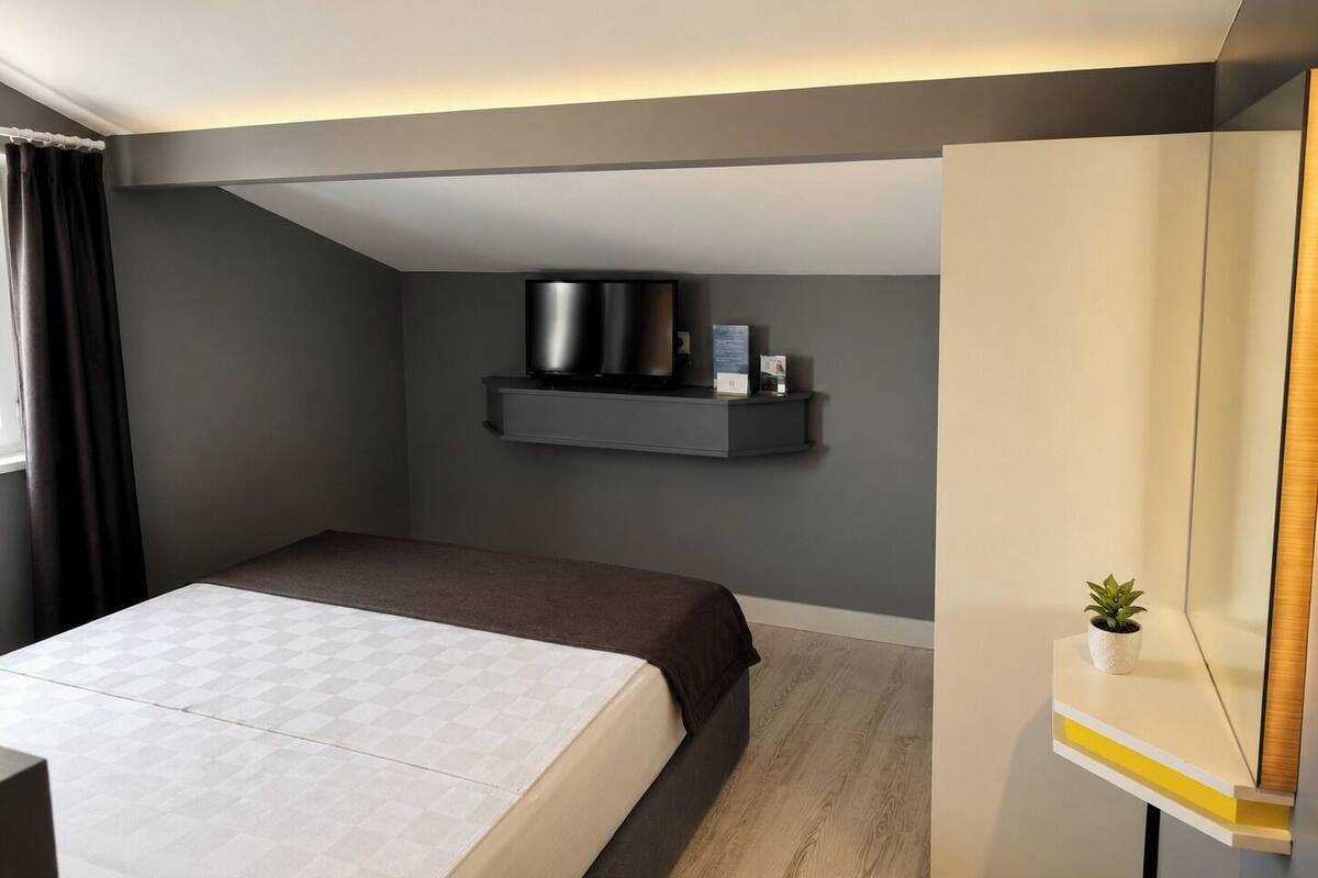 Economy Room, Non Smoking, City View | Premium bedding, minibar, soundproofing, iron/ironing board (on request)