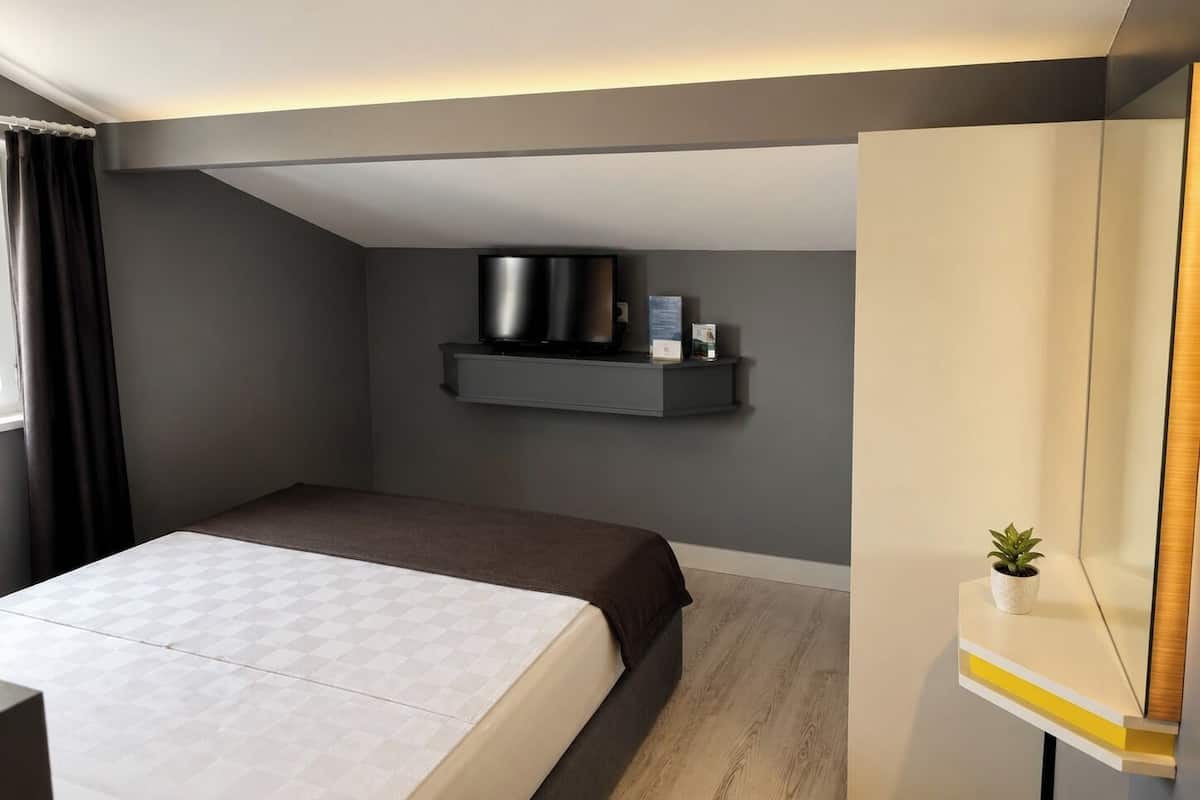 Economy Room, Non Smoking, City View | Premium bedding, minibar, soundproofing, iron/ironing board (on request)