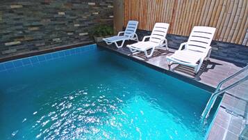 Outdoor pool, open 8:00 AM to 8:30 PM, sun loungers