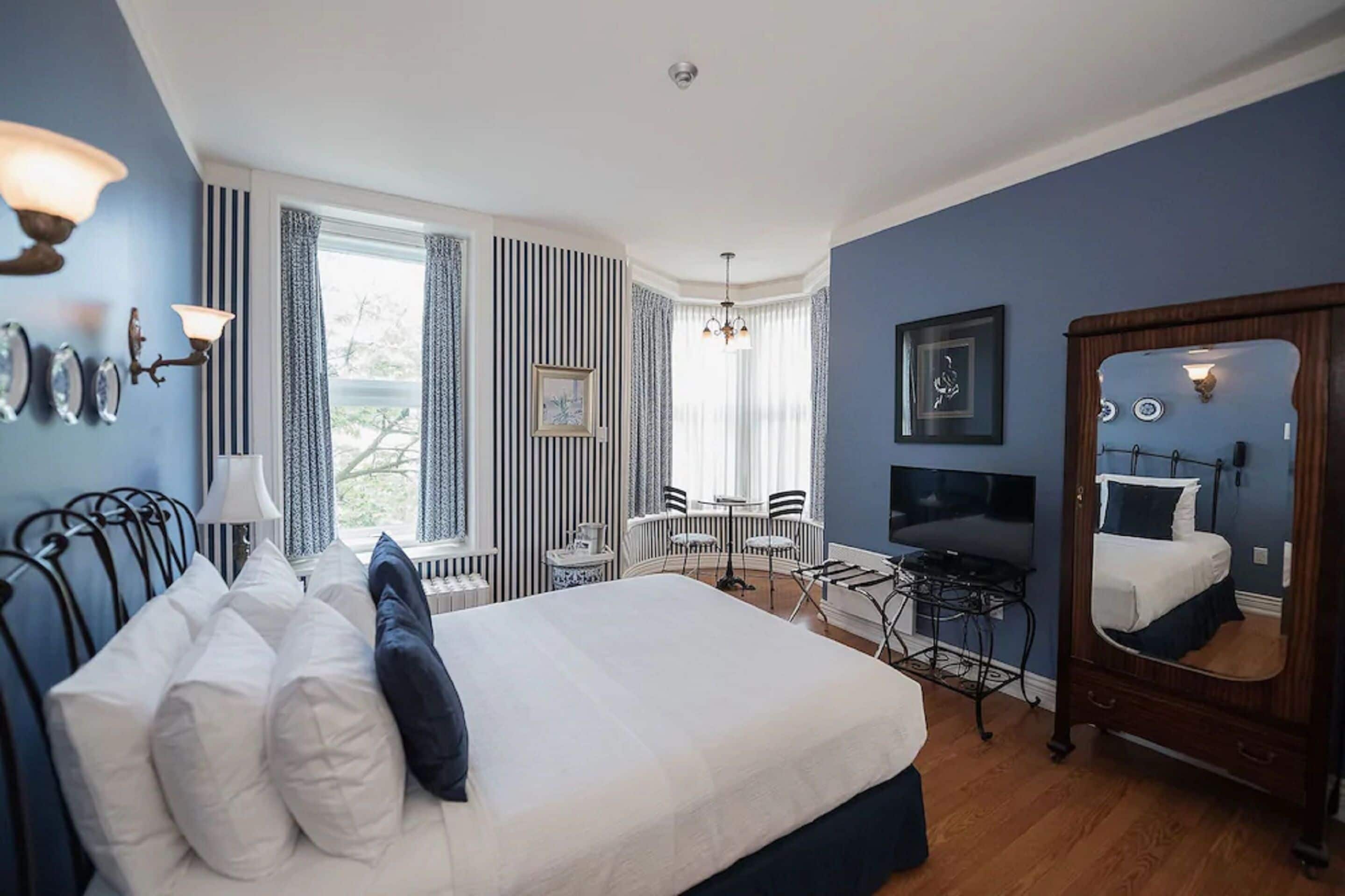 deluxe room, 1 queen bed | premium bedding, individually decorated, iron/ironing board, free wifi