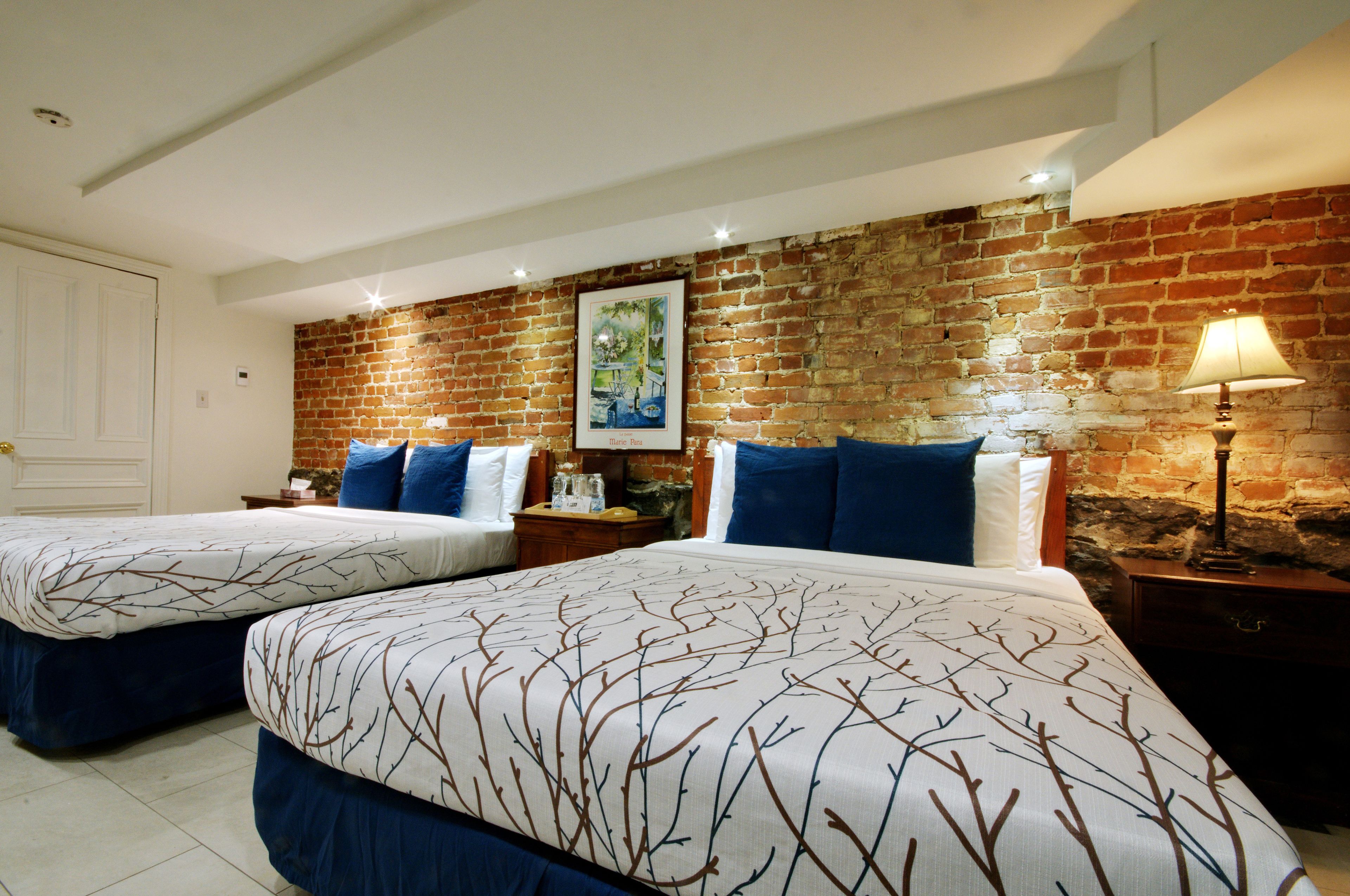 standard quadruple room, 2 queen beds (half-basement) | premium bedding, individually decorated, iron/ironing board, free wifi