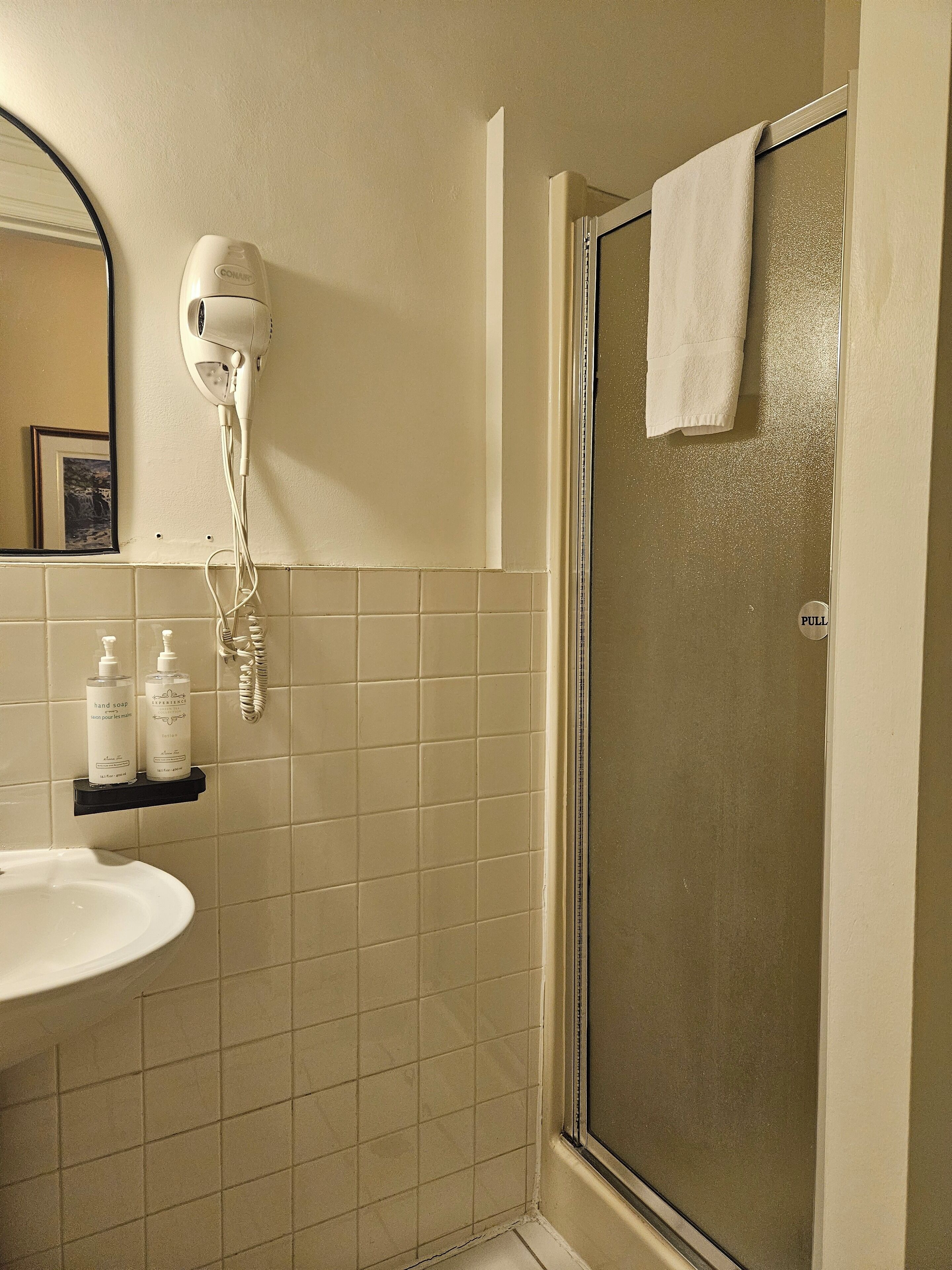 economy single room (exterior bathroom) | bathroom | designer toiletries, hair dryer, towels, shampoo