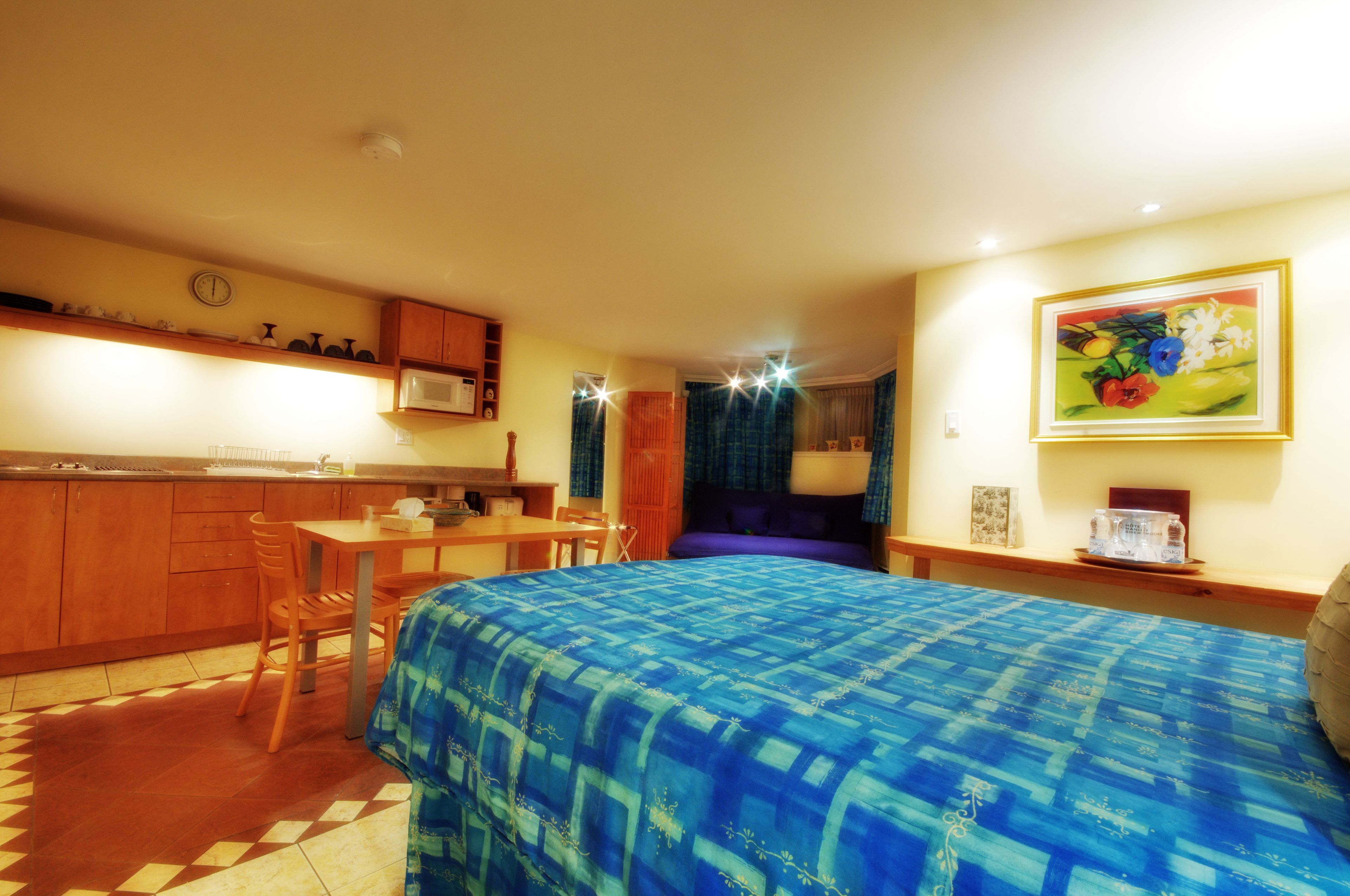 standard studio, 1 bedroom, refrigerator & microwave (half-basement) | premium bedding, individually decorated, iron/ironing board, free wifi