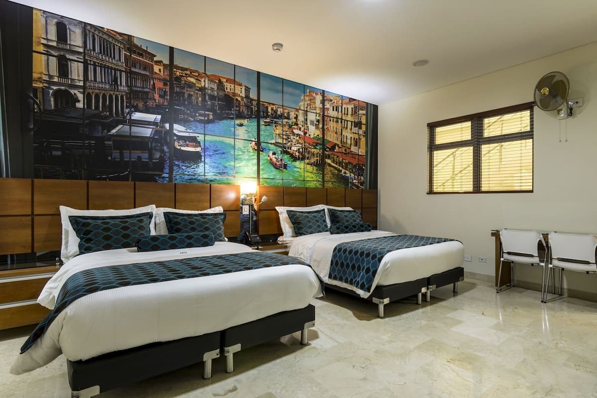 Premium bedding, down comforters, minibar, desk