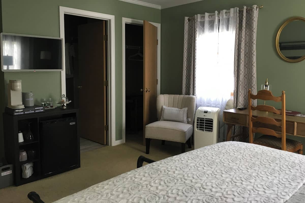Brass Room | Individually decorated, individually furnished, iron/ironing board
