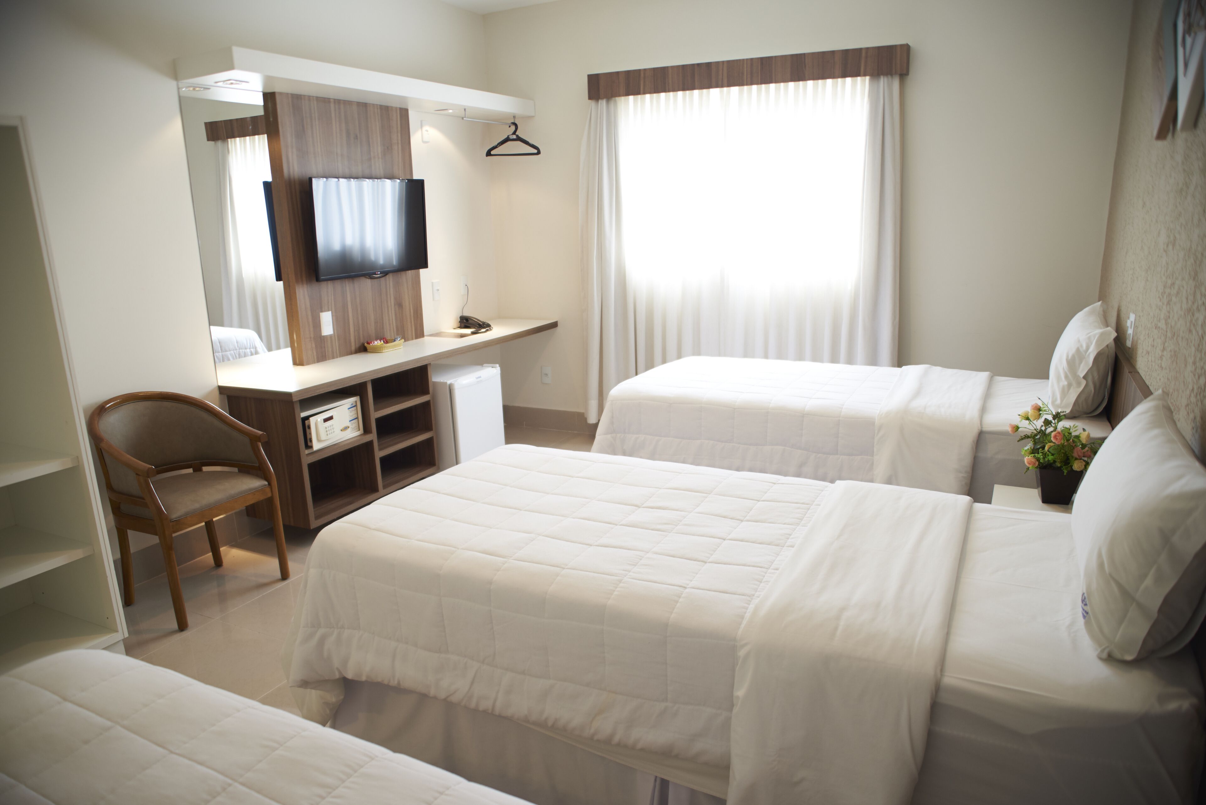 Minibar, desk, blackout curtains, iron/ironing board