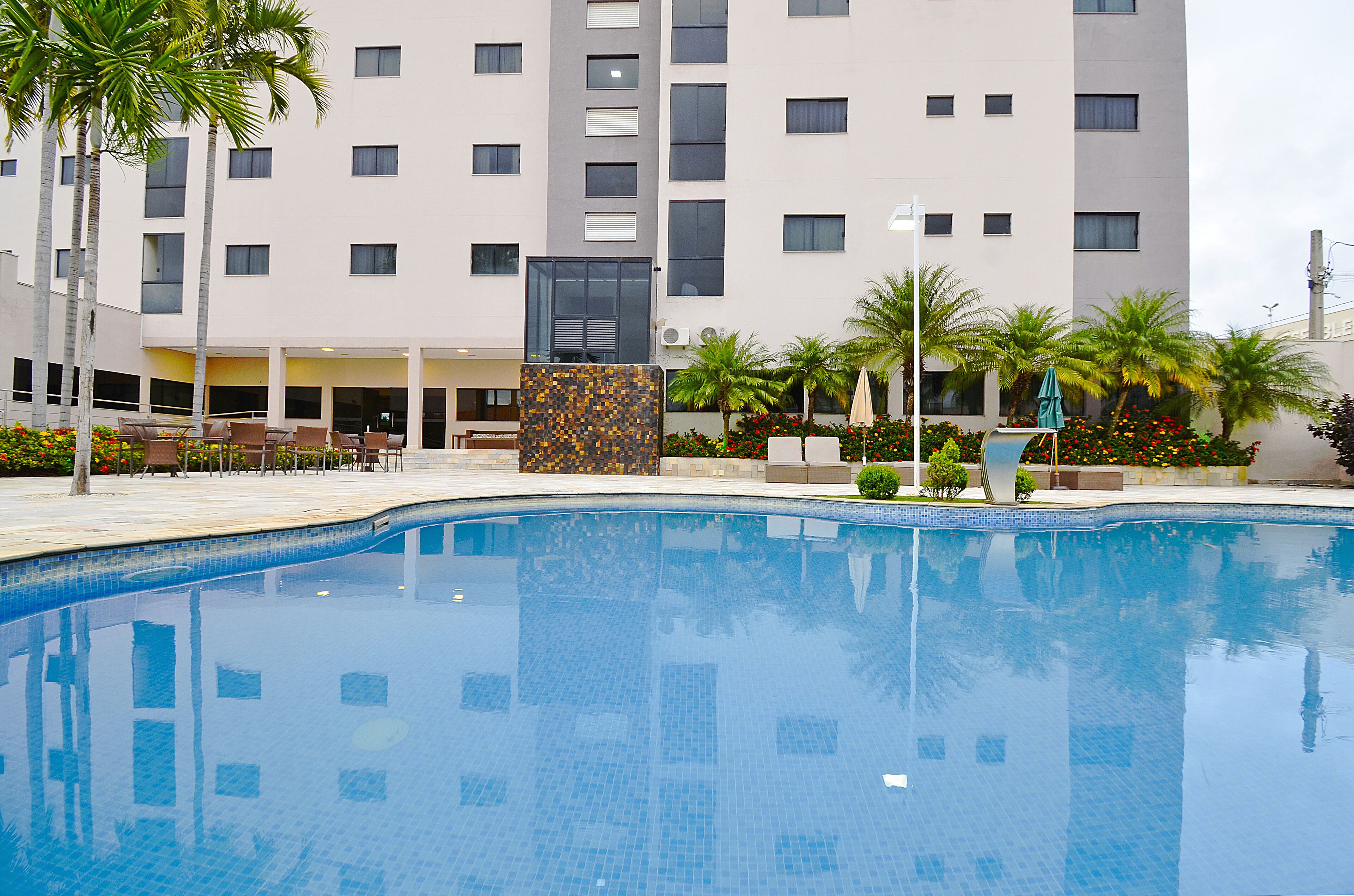 Outdoor pool, pool umbrellas, pool loungers