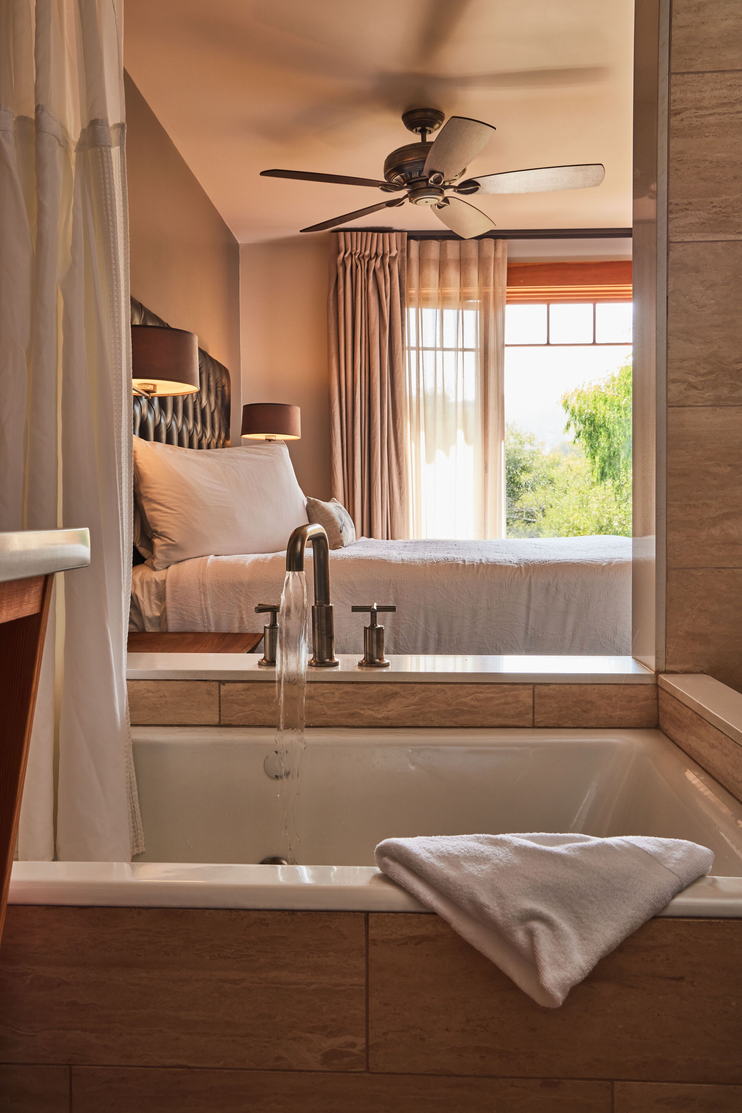 deluxe room, 1 king bed, garden view (creek view king) | down duvets, blackout curtains, iron/ironing board, free wifi