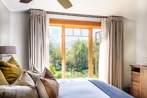 Deluxe Room, 1 King Bed, Garden View (Creek View King) | Down comforters, blackout drapes, iron/ironing board, free WiFi