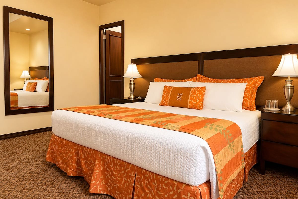 Junior Suite, 1 Queen Bed | Iron/ironing board, free WiFi, bed sheets