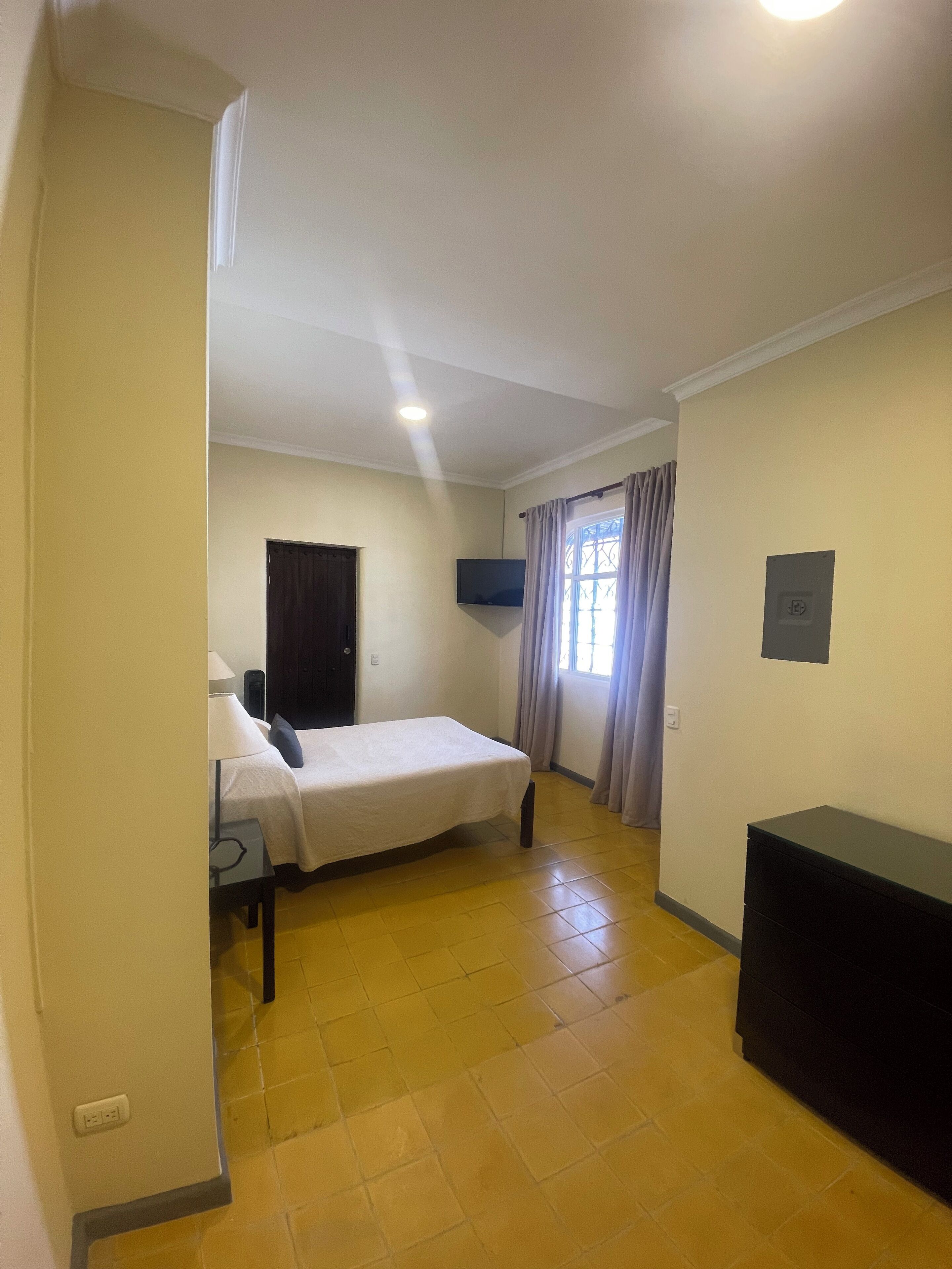 standard double room | living area | 32-inch plasma tv with cable channels, tv