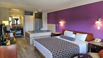 Habitació estàndard, 1 llit de matrimoni gran, banyera d'hidromassatge | Escriptori, wifi gratuïta i roba de llit