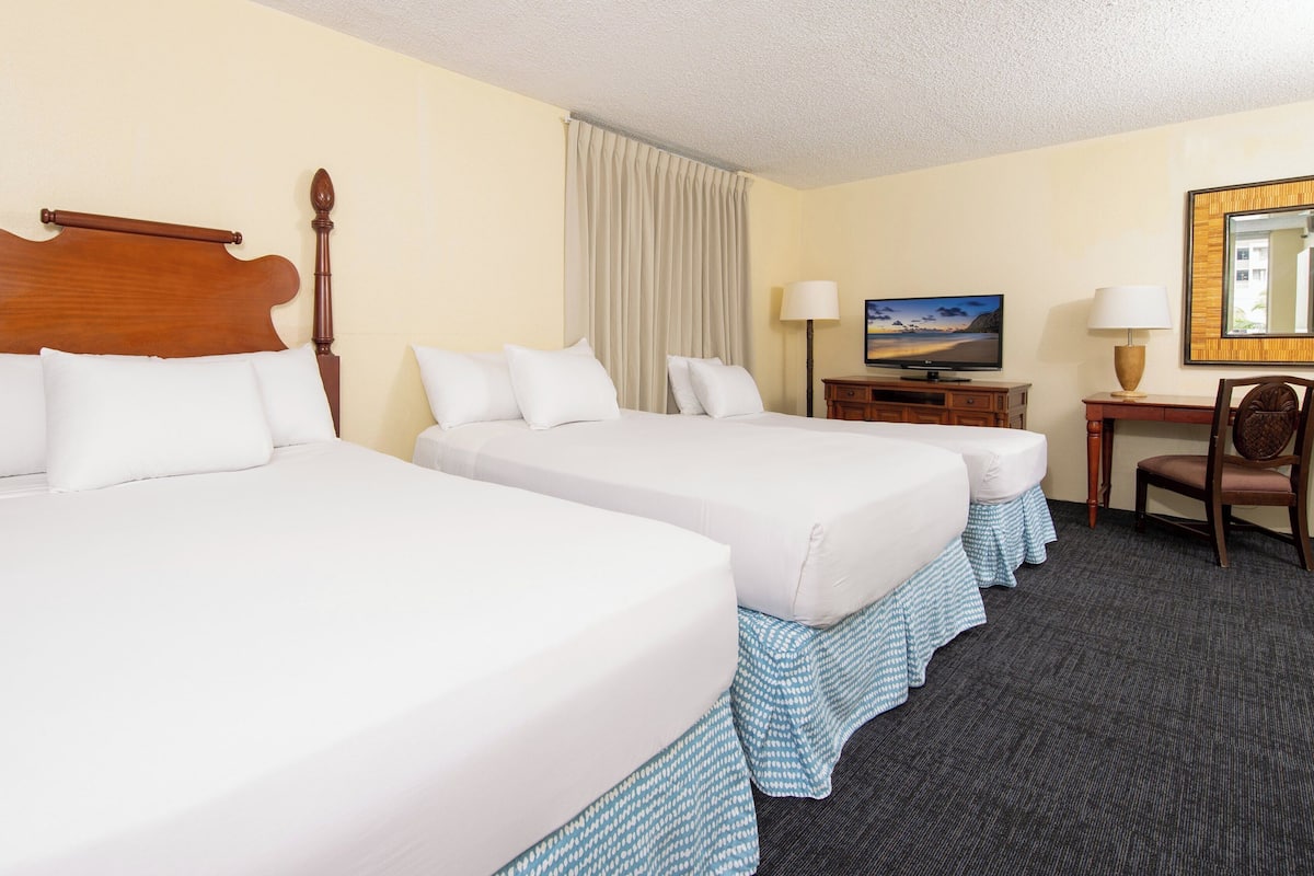 City View Deluxe Three Beds with Kitchen | In-room safe, desk, laptop workspace, blackout drapes