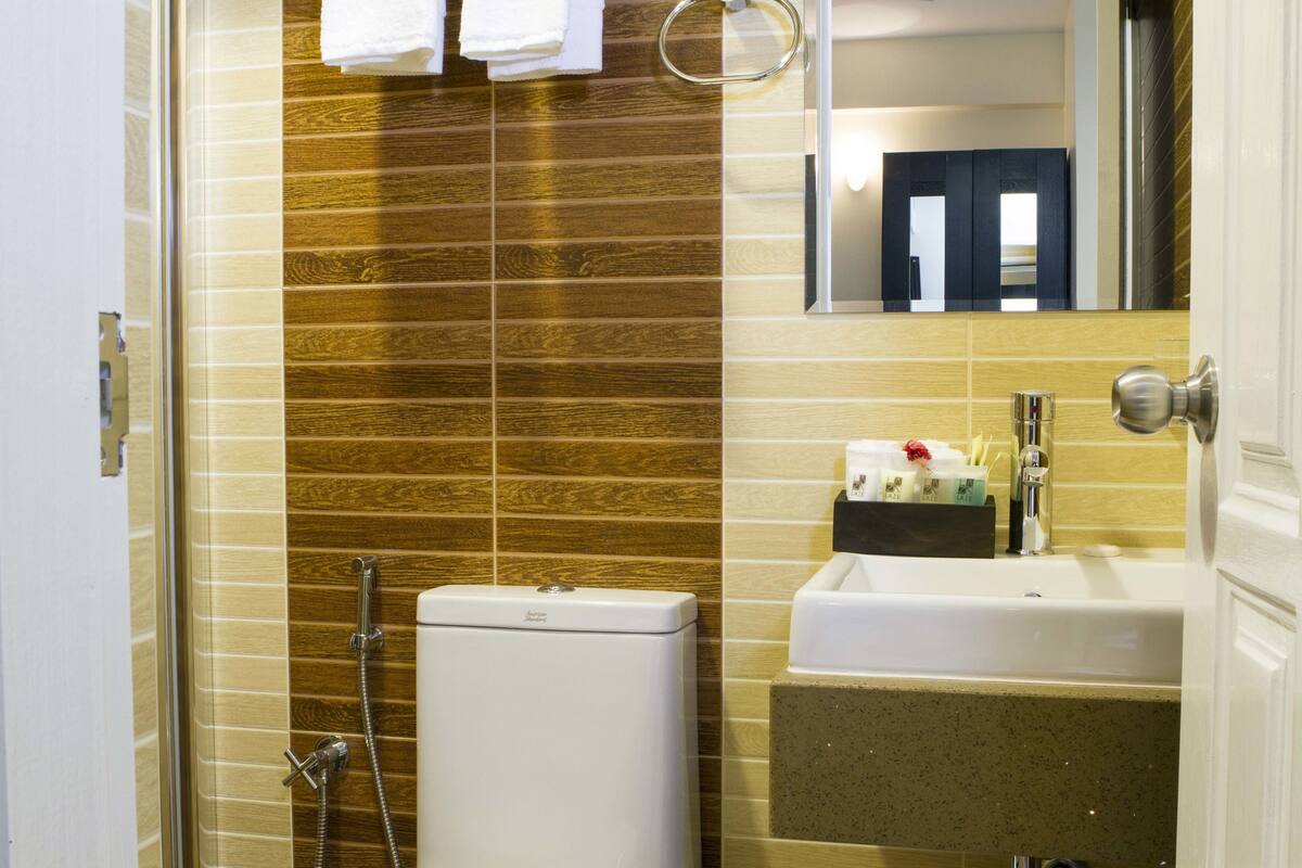 shower, free toiletries, hair dryer, dressing gowns