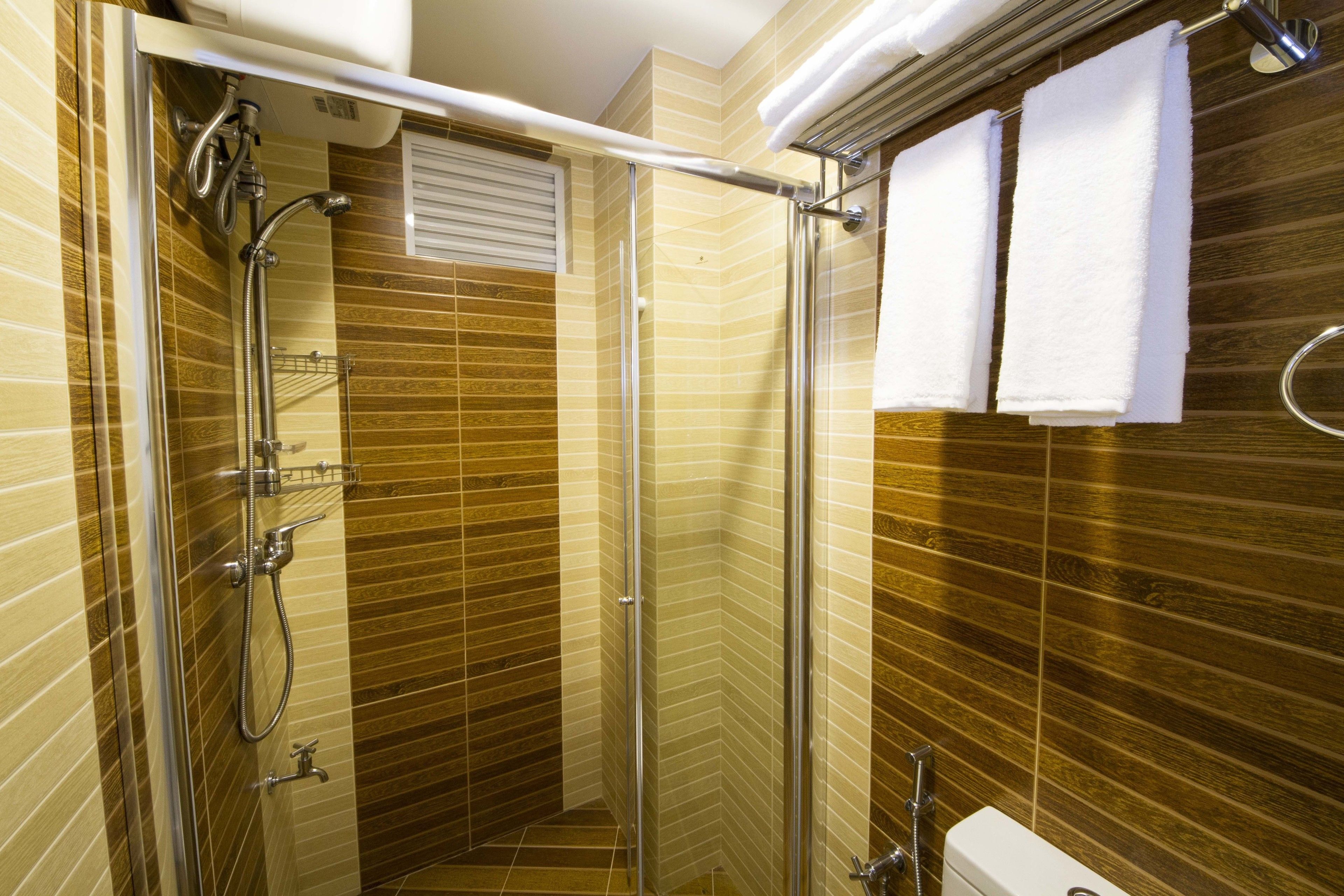 shower, free toiletries, hair dryer, dressing gowns