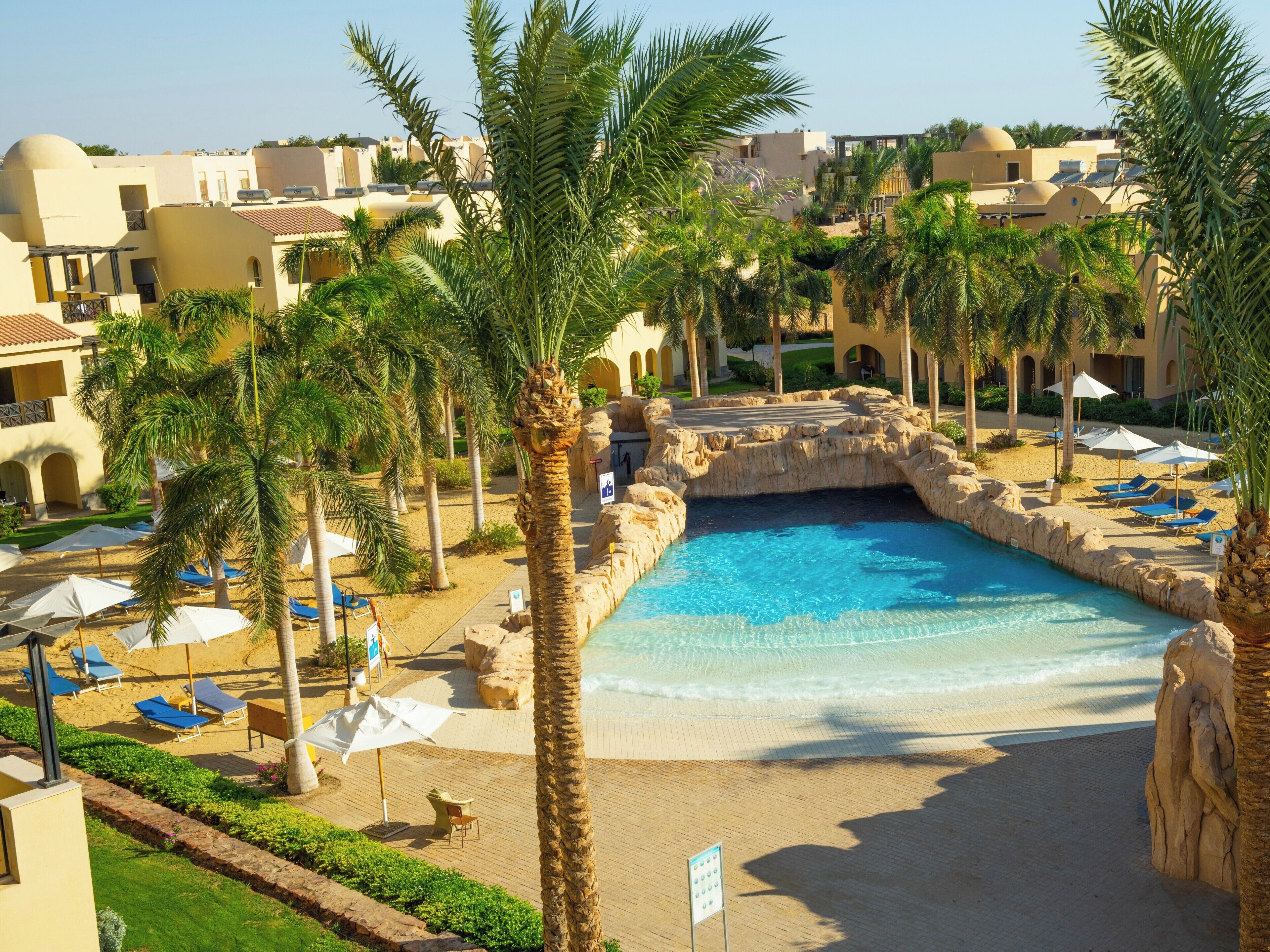 8 outdoor pools, pool umbrellas, sun loungers