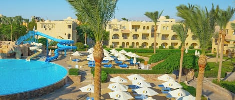 8 outdoor pools, pool umbrellas, pool loungers