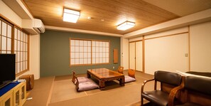 Standard Room, Multiple Beds | Living area | Flat-screen TV - Yudanaka Ryokan Hakura (Yamanouchi)